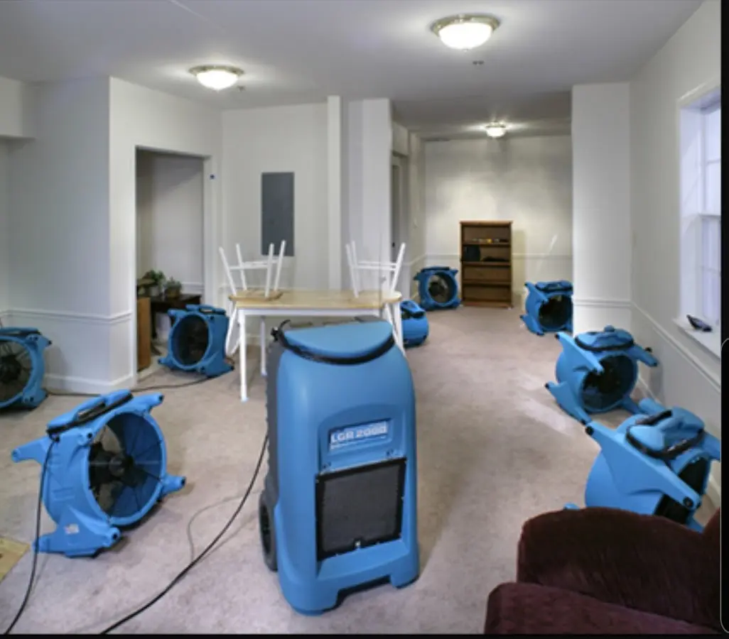 Air movers and dehumidifier setup for Water Damage Restoration in Albertville